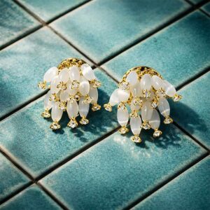 White and gold beaded dangle earrings