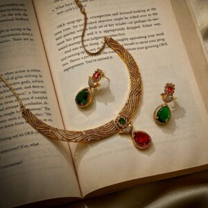 Antique gold bird motif necklace set with CZ stones