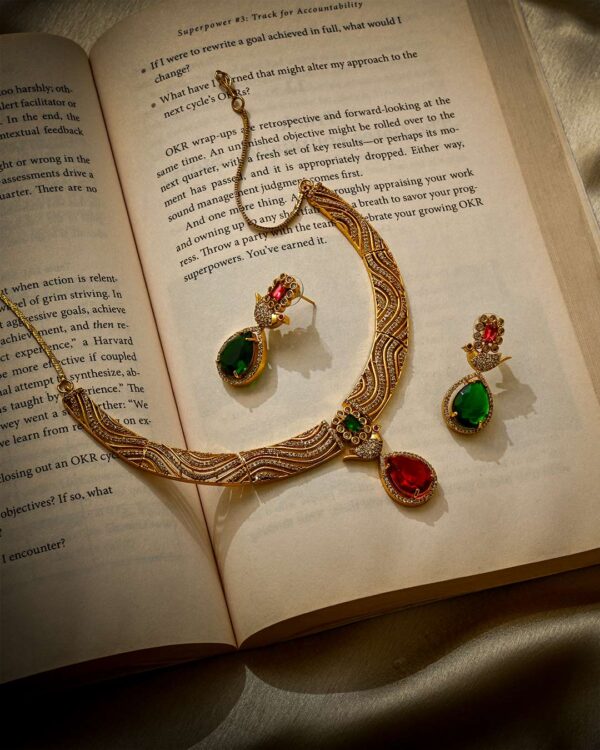 Antique gold bird motif necklace set with CZ stones