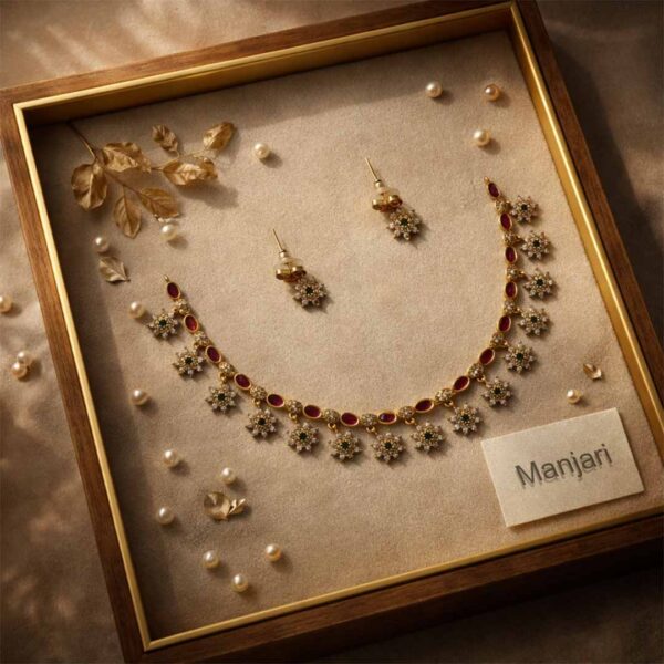 gold plated floral jewellery set close up